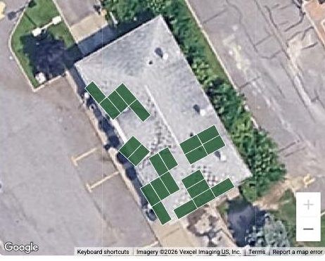 Satellite photo of a roof with solar panels drawn to scale